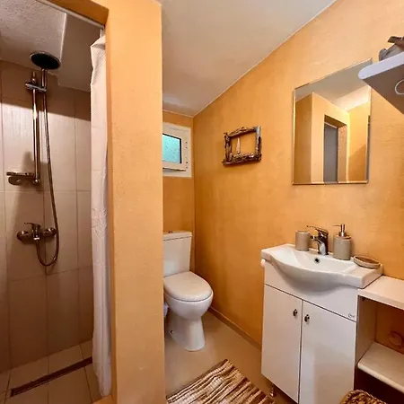 Under The Vine Garden House